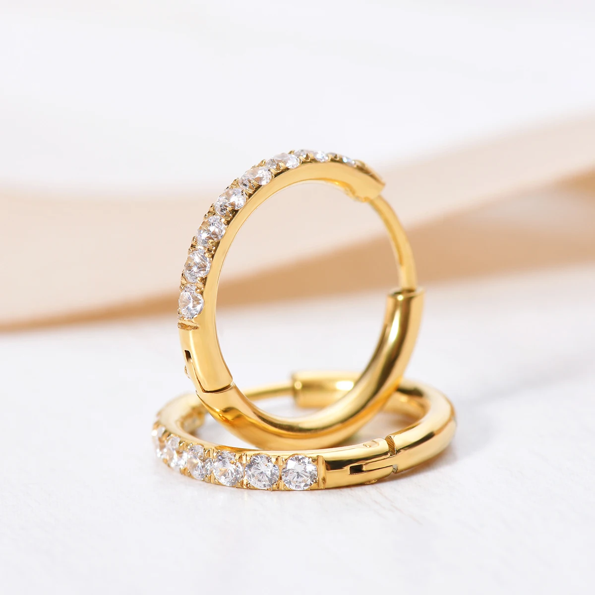 Brincos de argola cz de aço in - Conch Earring Hoop avaliação e preço