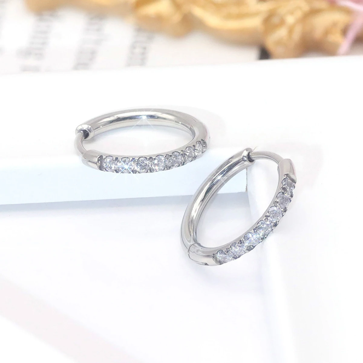Brincos de argola cz de aço in - Conch Earring Hoop avaliação e preço